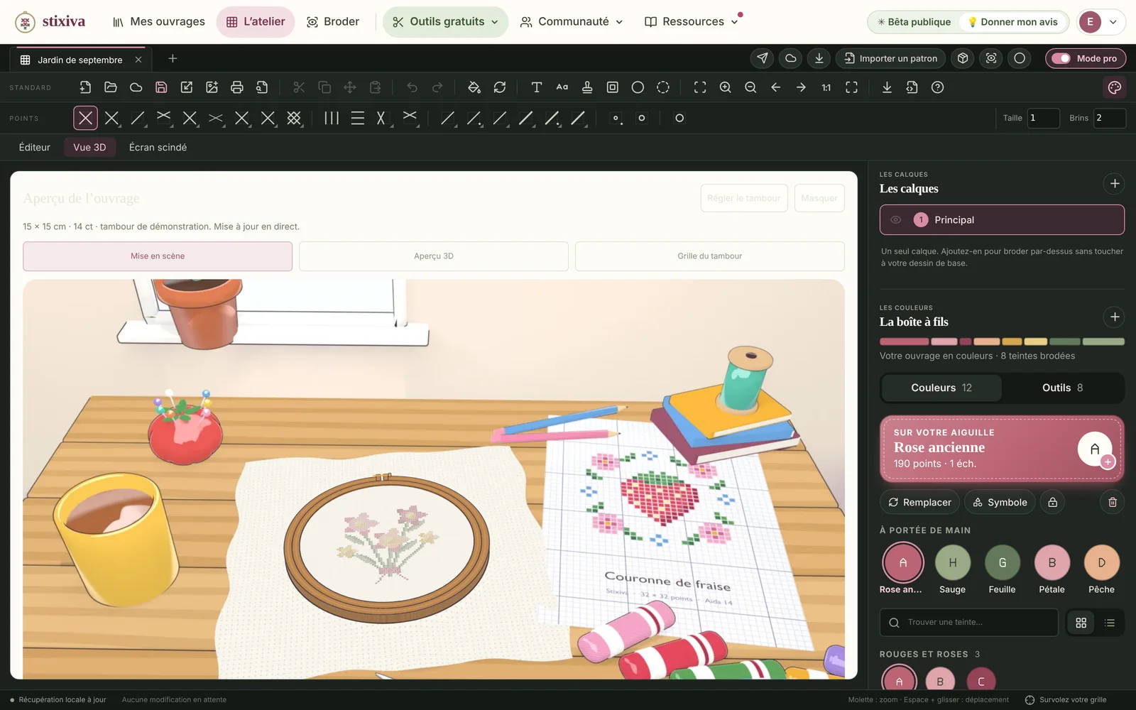 Vue 3D de l’atelier : le bouquet brodé dans son tambour, posé sur une table